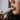 Person applicerar läppbalsamet “Softening Lips” från Cana Care på läpparna i närbild.